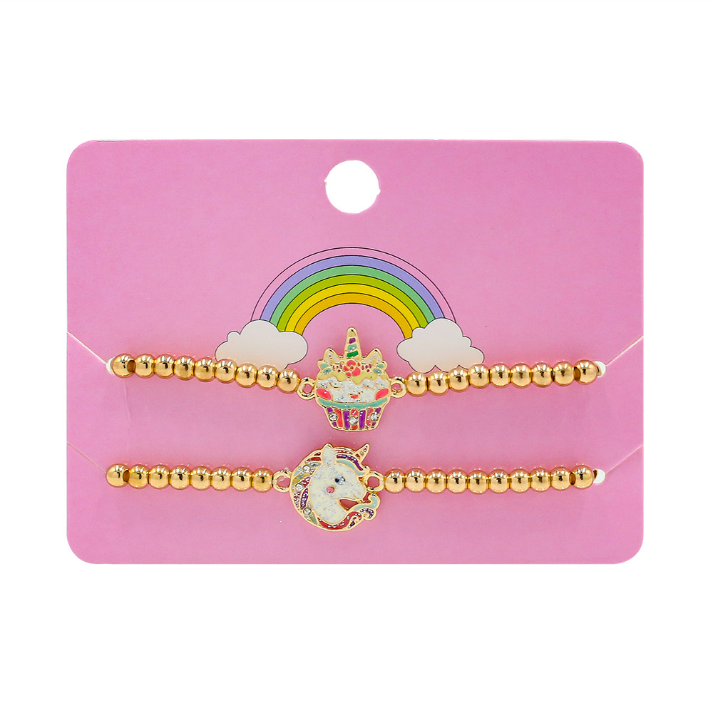 gold beaded charm bracelets – unicorn & cupcake