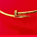 gold tone nail collar necklace with crystal accent