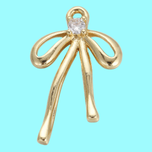 gold bow charm pendant with crystal accent