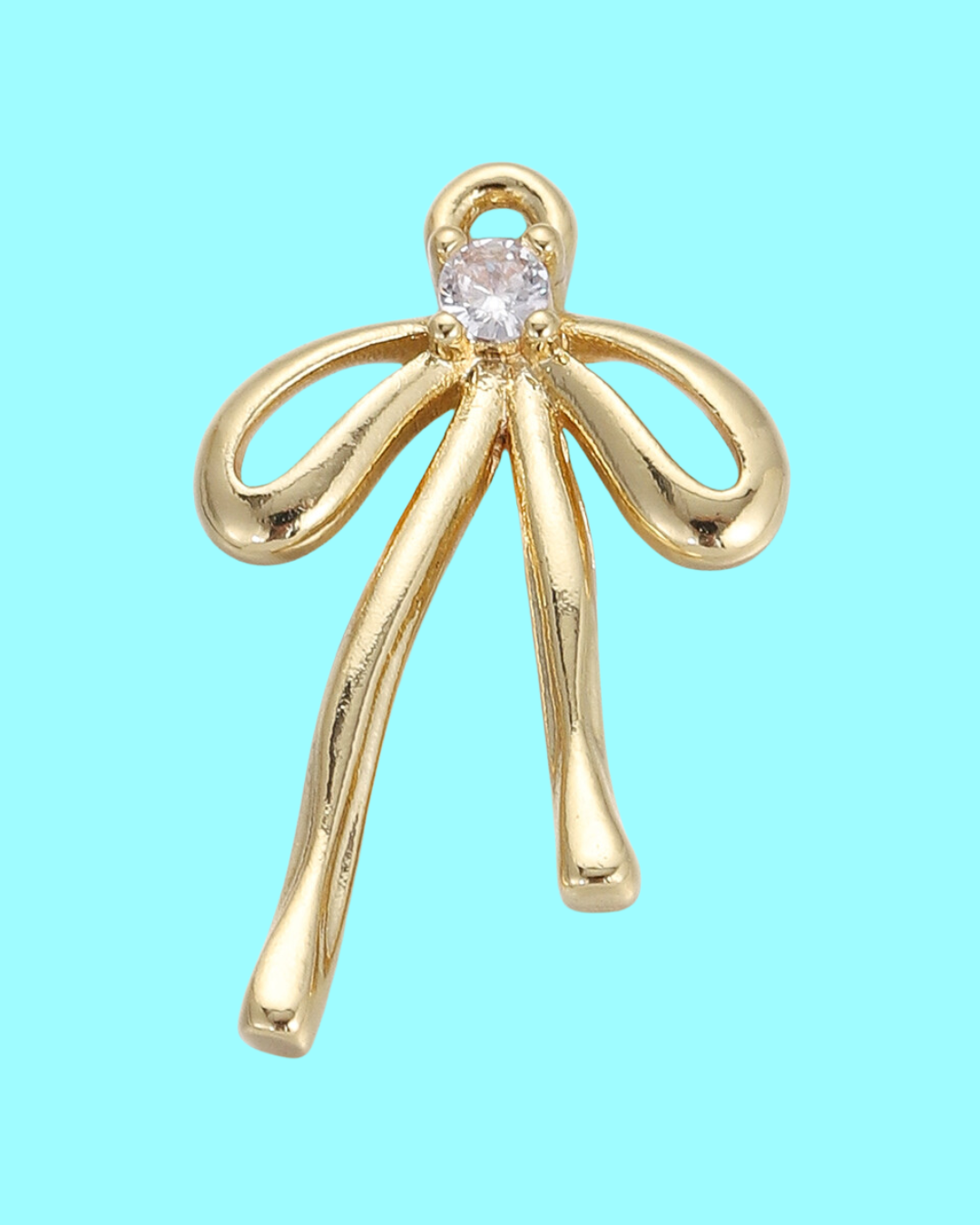 gold bow charm pendant with crystal accent