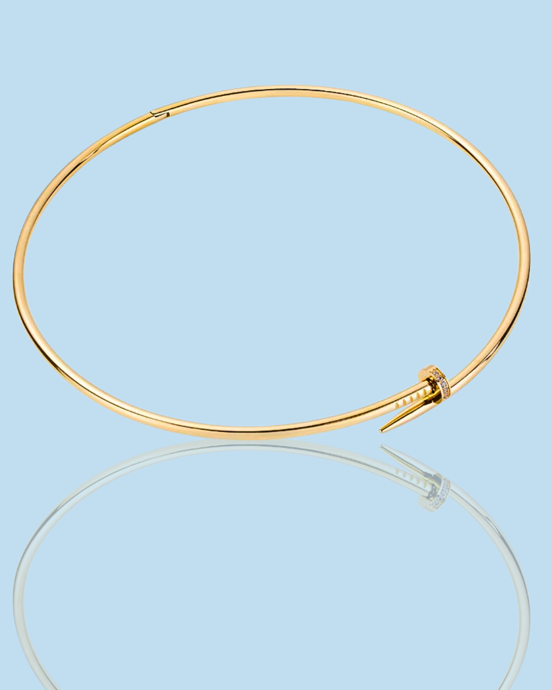 gold tone nail collar necklace with crystal accent