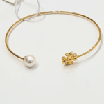 elegant gold toned hinged logo bangle