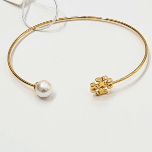 elegant gold toned hinged logo bangle