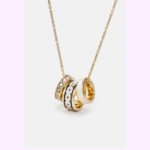 coach signature enamel ring with crystals.