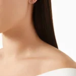 heart stud earrings with pink and red crystal accents.