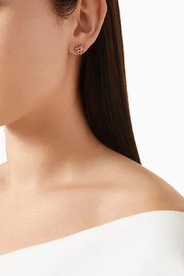 heart stud earrings with pink and red crystal accents.