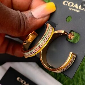 coach signature enamel hoop earrings in a colorblock design