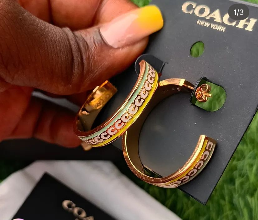 coach signature enamel hoop earrings in a colorblock design