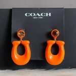coach large signature enamel earring in orange with crystal stud
