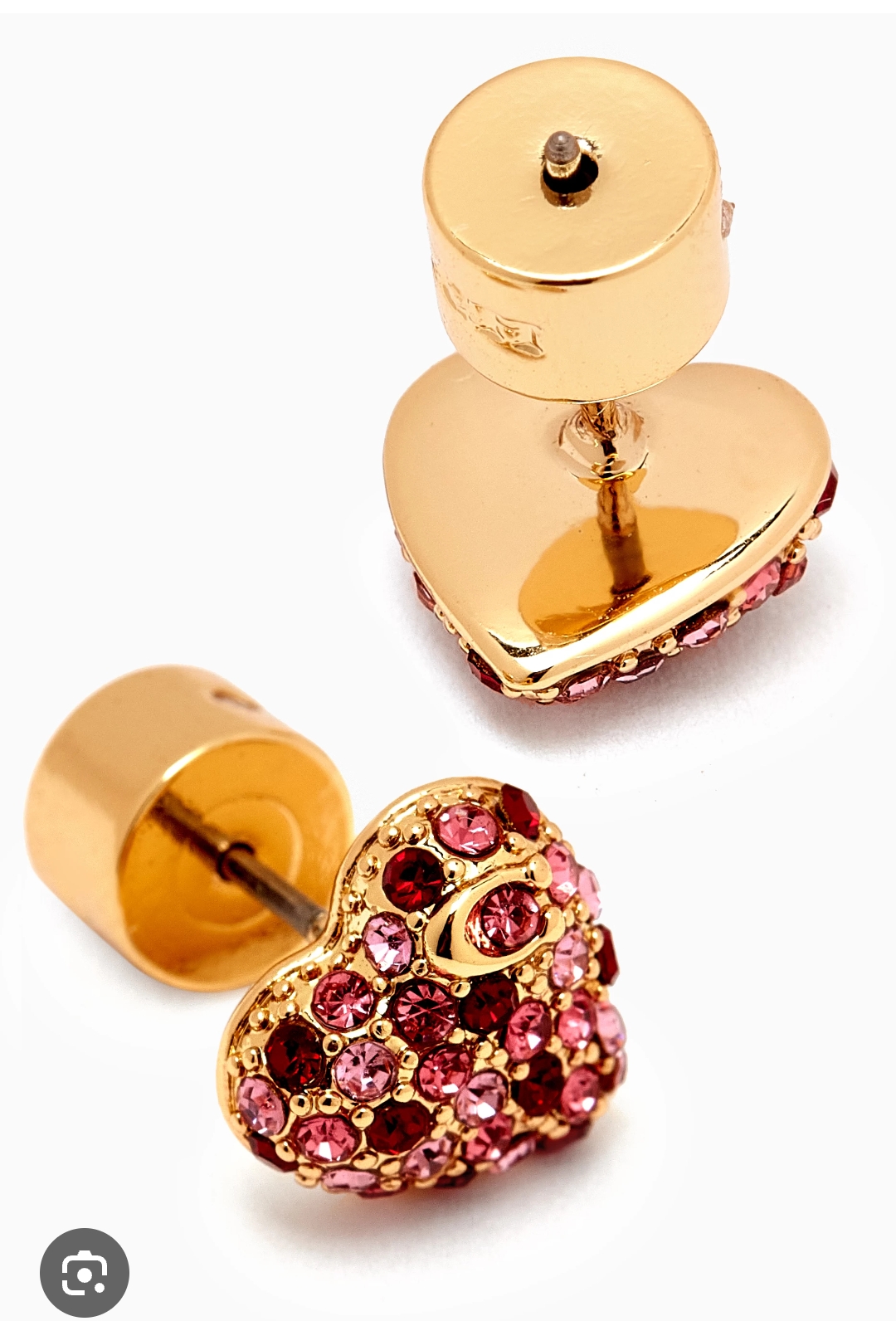 heart stud earrings with pink and red crystal accents.