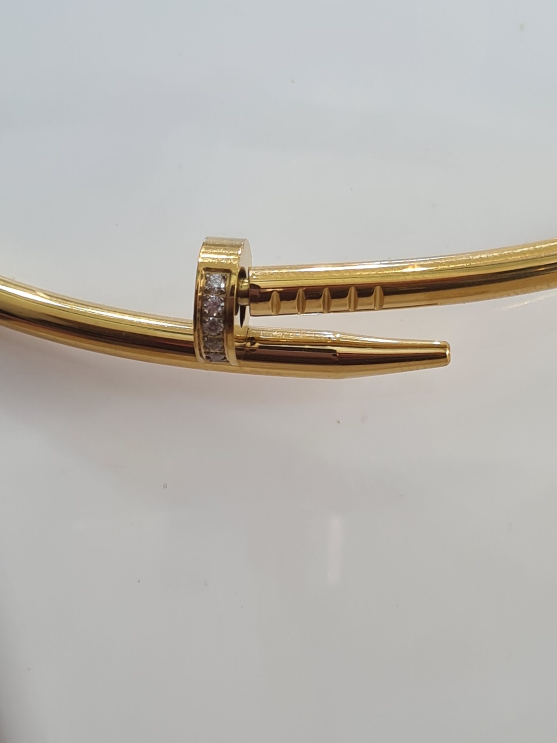 gold tone nail collar necklace