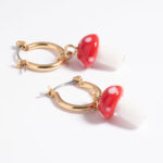 gold tone red mushroom drop earrings
