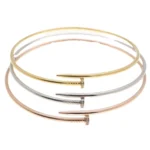 rose gold tone nail collar necklace