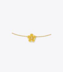 yellow enamel floral logo bracelet in gold tone