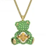 green crystal teddy pendant – gold tone